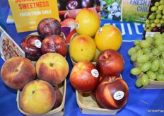 Stone fruit from Chile on display, including lemon plums.